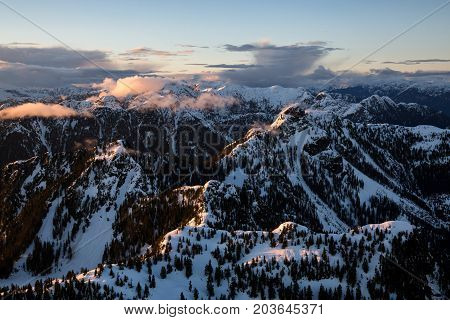 Beautiful Aerial Landscape View Of North Shore Mountains During A Colorful Cloudy Sunset. Taken In V