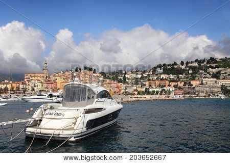 MENTON, FRANCE - APRIL 30, 2015: Menton cityscape and harbour on April 30, 2015 in Menton, France. It is a popular tourist resort on French Riviera.
