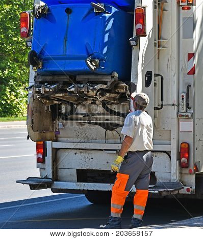 Garbage truck at work in the city