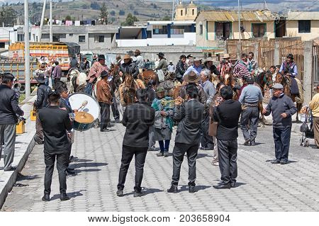 June 10 2017 Toacazo Ecuador: marching band setting the tone at the morning gathering of horsemen before the weekend rodeo