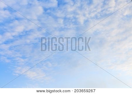 Sunrise or sunset white cirrocumulus clouds sky background