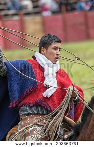 June 10 2017 Toacazo Ecuador: a cowboy called 'chagra' handling lasso on horseback in the Andes