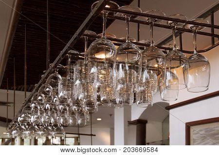 Wine glass hanging on the steel rack stuck with ceiling.