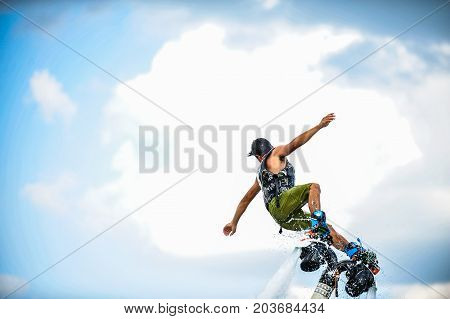 The man on flyboard. extreme water sport.