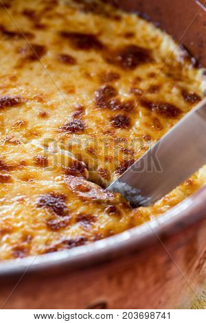Pastitsio Traditional Greek Baked Pasta Casserole With Ground Beef, Tomatoes, Feta Cheese And Becham