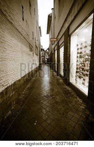 MAASTRICHT NETHERLANDS - JANUARY 09 2015: The streets in the historic center.Vintage toning. Stylization. Maastricht is the oldest city of the Netherlands and the capital city of the province of Limburg.