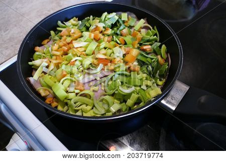 Chicken With Fresh Vegetables On A Frying Pan