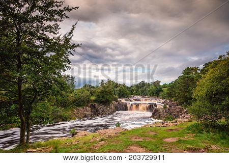 Low Force Waterfall, as the River Tees cascades over the Whin Sill at Low Force, the Pennine Way follows the southern riverbank