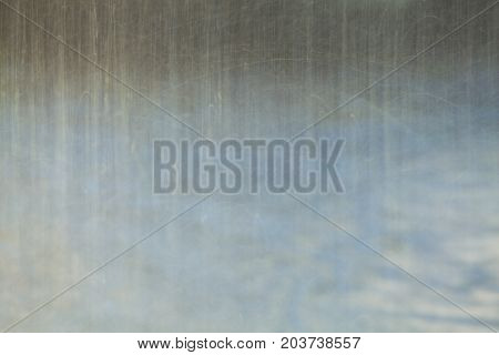 blue color tone of close up rain water drop falling to the floor in rainy season