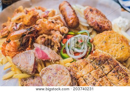 Big Set Greek Food Meat Plate With Potatoes And Sauce
