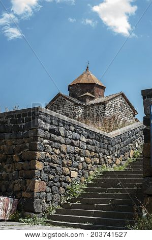 Armenia. The fortress walls and the church of the Surb Arakelots in the monastery of Sevanavank built in the eighth century.