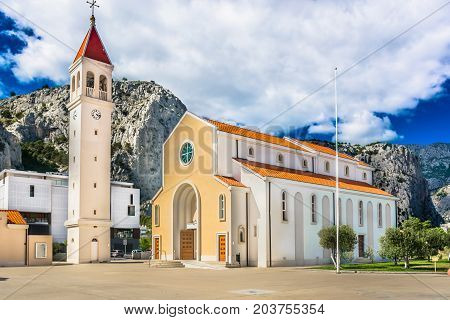 View at outdoors public church in town Omis, Croatia, Adriatic coast.
