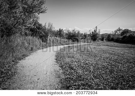 Black and white picture of a trail in Valconca Italy