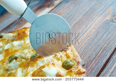 homemade pizza with rockfish ., close up