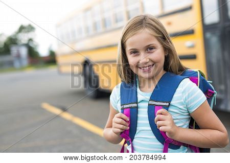 A nine years old girl student at school
