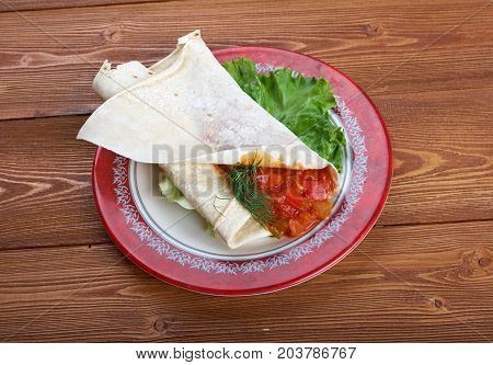 Matbucha with pita. breakfast Maghreb , close up meal