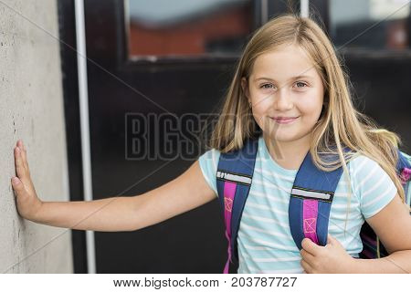 A nine years old girl student at school