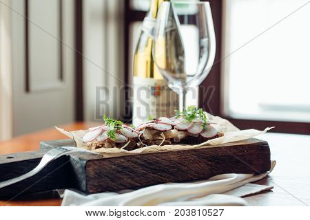Sandwiches With Boar Ham, Radish, Sprouts, And Rye Bread