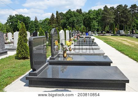 Tombstones in the Public cemetery in summer