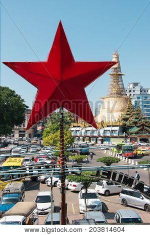 YANGON, MYANMAR - JANUARY,20,2016: Buddhist monks bhikkhunis in festive attire in Shwedagon Pagoda.during the celebration of the Buddhist holiday.in Yangon, Myanmar.