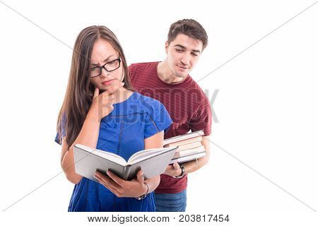 Boyfriend Reading From Girlfriend's Book From Behind