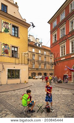 Warsaw, Poland - August 2, 2017: Architecture And People On The Street New World In Warsaw.