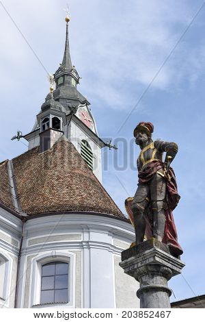 Church And Sculpture Of Schwyz On Switzerland