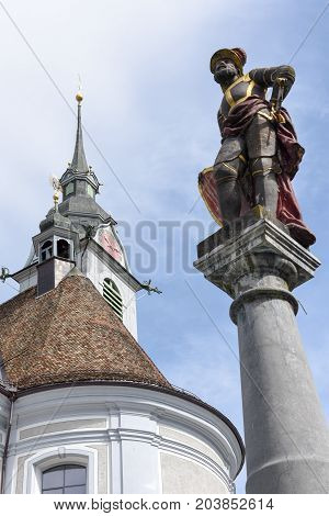 Church And Sculpture Of Schwyz On Switzerland