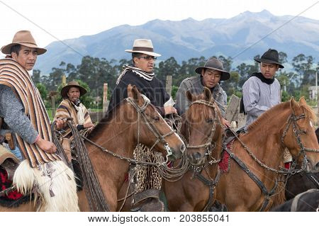 June 3 2017 Machachi Ecuador: group of cowboys called 'chagra' on horse back at a rural rodeo in the Andes