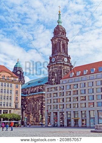 Dresden, Germany - April 19, 2017: View of the dark towers of the Kreuzkirche church from Altmarkt square