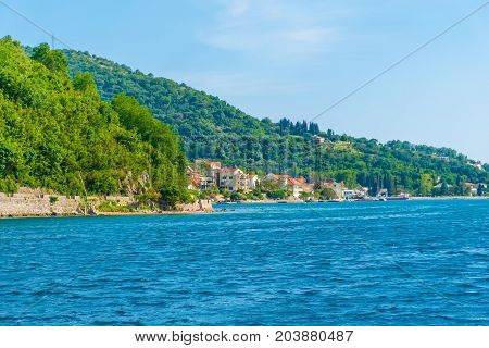 Montenegro, Kamenari And Lepetane - June 04/2017: Sea Ferries Carry Cars And Buses With Tourists Bet