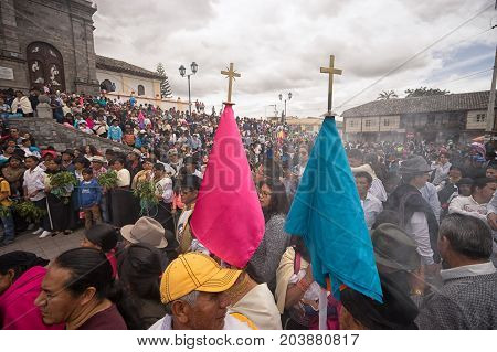 April 14 2017 CotacachiEcuador: indigenous kechwa crowd at the Easter procession watching the reenacting of crucifixion