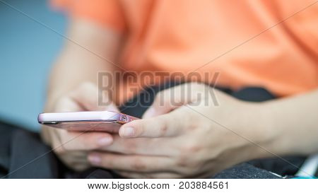 blurred of hands student testing exercise exams answer on tablet by finger clicking Concept Educational technology use physical hardware computer-based online learning technologies in school.