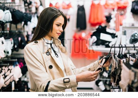Beautiful young woman shopping lingerie and underware