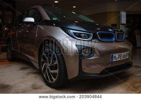 BERLIN - NOVEMBER 28 2014: Showroom. The BMW i3 previously Mega City Vehicle (MCV) is a five-door urban electric car developed by the German manufacturer BMW.