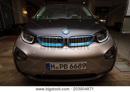 BERLIN - NOVEMBER 28 2014: Showroom. The BMW i3 previously Mega City Vehicle (MCV) is a five-door urban electric car developed by the German manufacturer BMW.