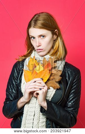 Woman With Autumn Leaves In Leather Jacket.