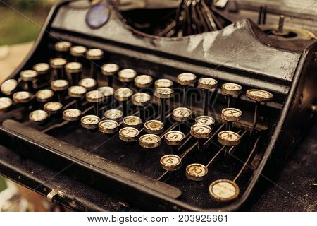 Keyboard of Typewriter Machine retro vintage style, selective focus, toned
