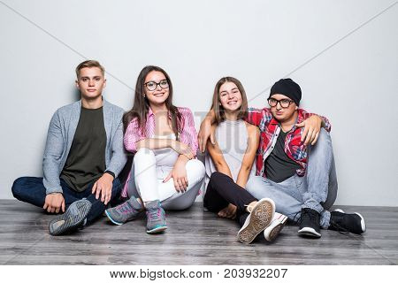 Young Group Of Friends Students Teengers Sitting On Floor
