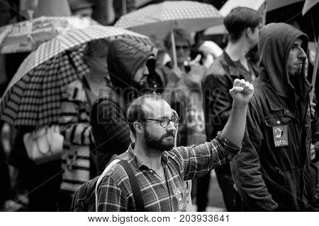 Raisen Hand By Male Protester At Anti-macro Protest