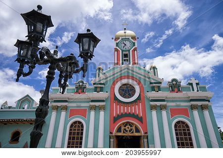 March 12 2017 Vilcabamba Ecuador: colourful church facade in the popular tourist destination town in the Andes