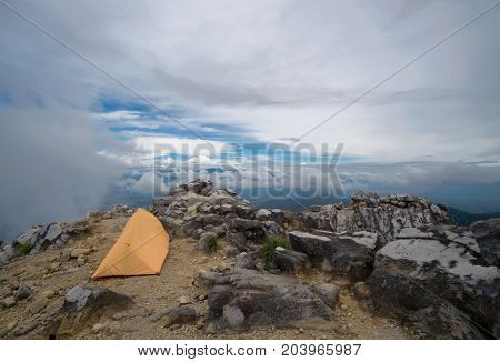 Camping Tent At The Edge Of The World. Summit Of Sibayak Volcano, Sumatra, Indonesia