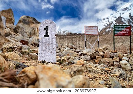 1st Kilometer stone in Himalaya mountains. Gangotri glacier Gaumukh India.