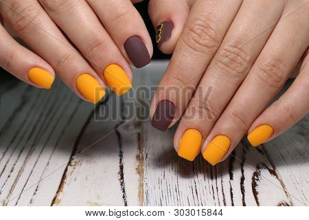 Multi-colored Pastel Manicure Combined Tone On Tone With A Striped Background.nail Art