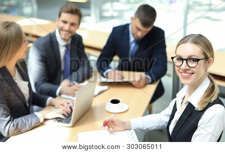Top View Of Business People Working Together While Spending Time In The Office.