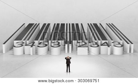 Young businessman standing in front of a big codebar