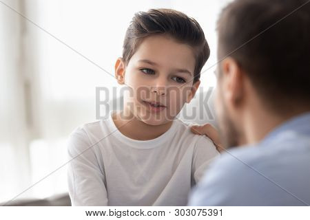 Caring Dad Talk With Little Son Showing Love And Support