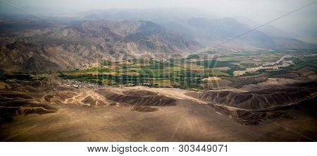 Aerial Airplane Panoramic View To Nazca Plateau With Geoglyph Lines , Ica Region, Peru