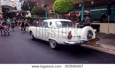 Singapore - May 25, 2019: Ford Thunderbird 1957 In White Color Parked On The Street. Left Back Side 