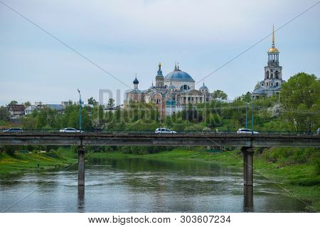 Torzhok, Russia - May, 15, 2019: image of the bridge and passing cars in Torzhok, Russia